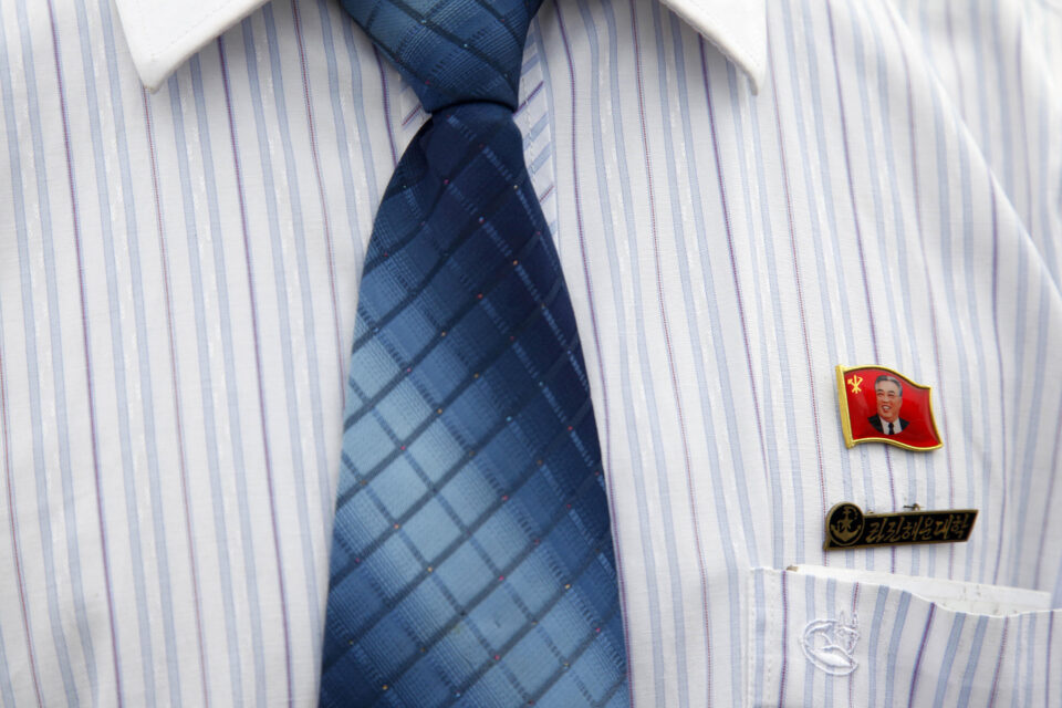 Once treasured lapel pins of North Korea’s former leaders now sell for cheap