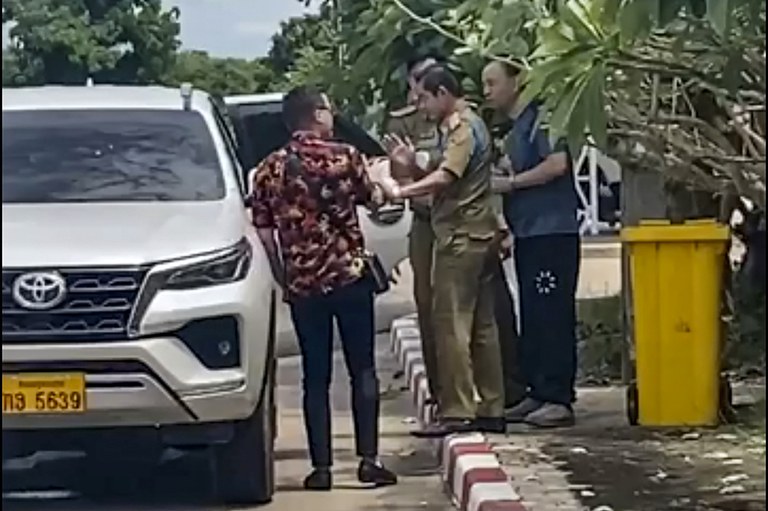 Lao police detain Chinese rights lawyer who was headed to the United States
