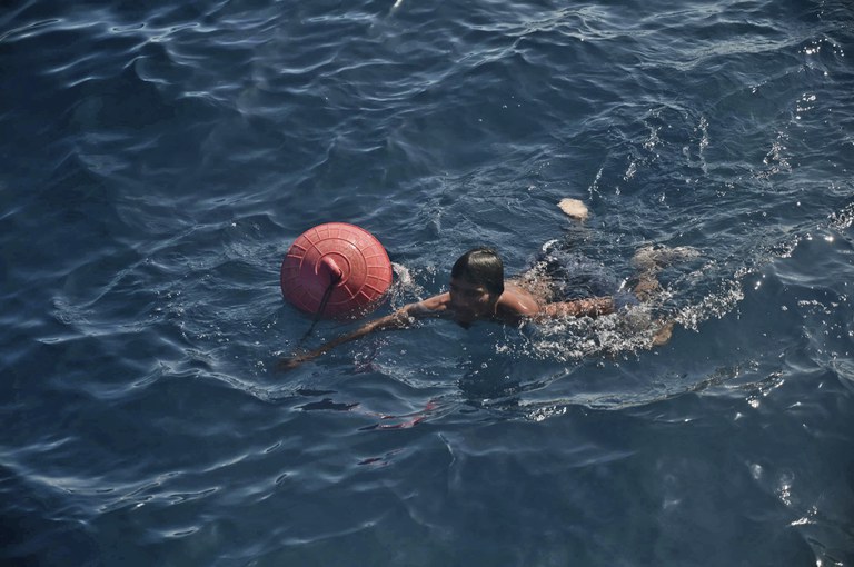 Dozens of Rohingya rescued from capsized boat off Indonesian coast