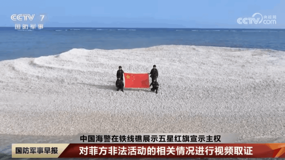 China, Philippines raise rival flags on disputed South China Sea sandbank